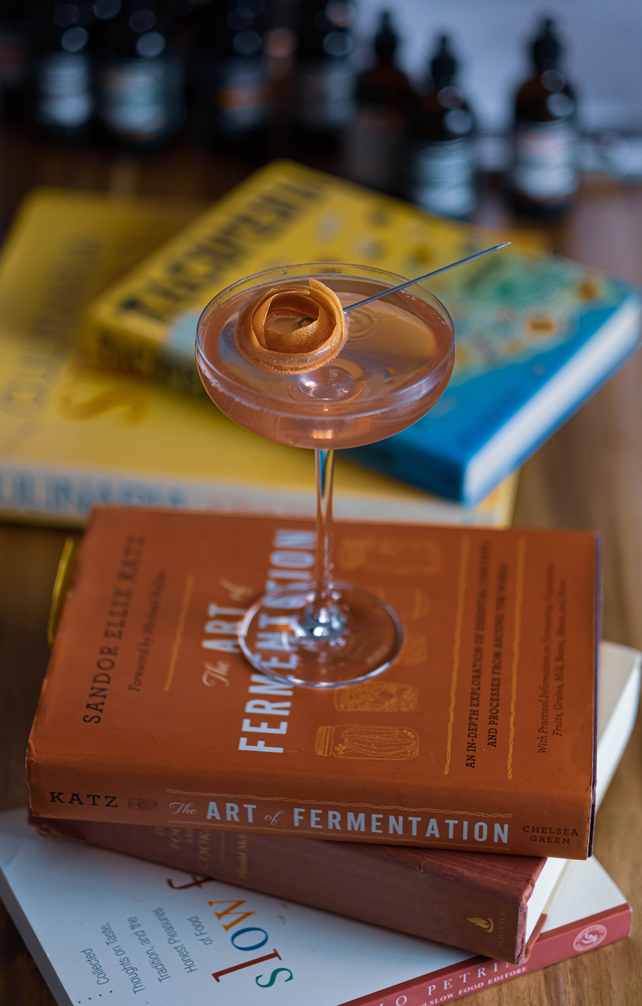 Bodega du Cap Cocktail on top of a stack of books